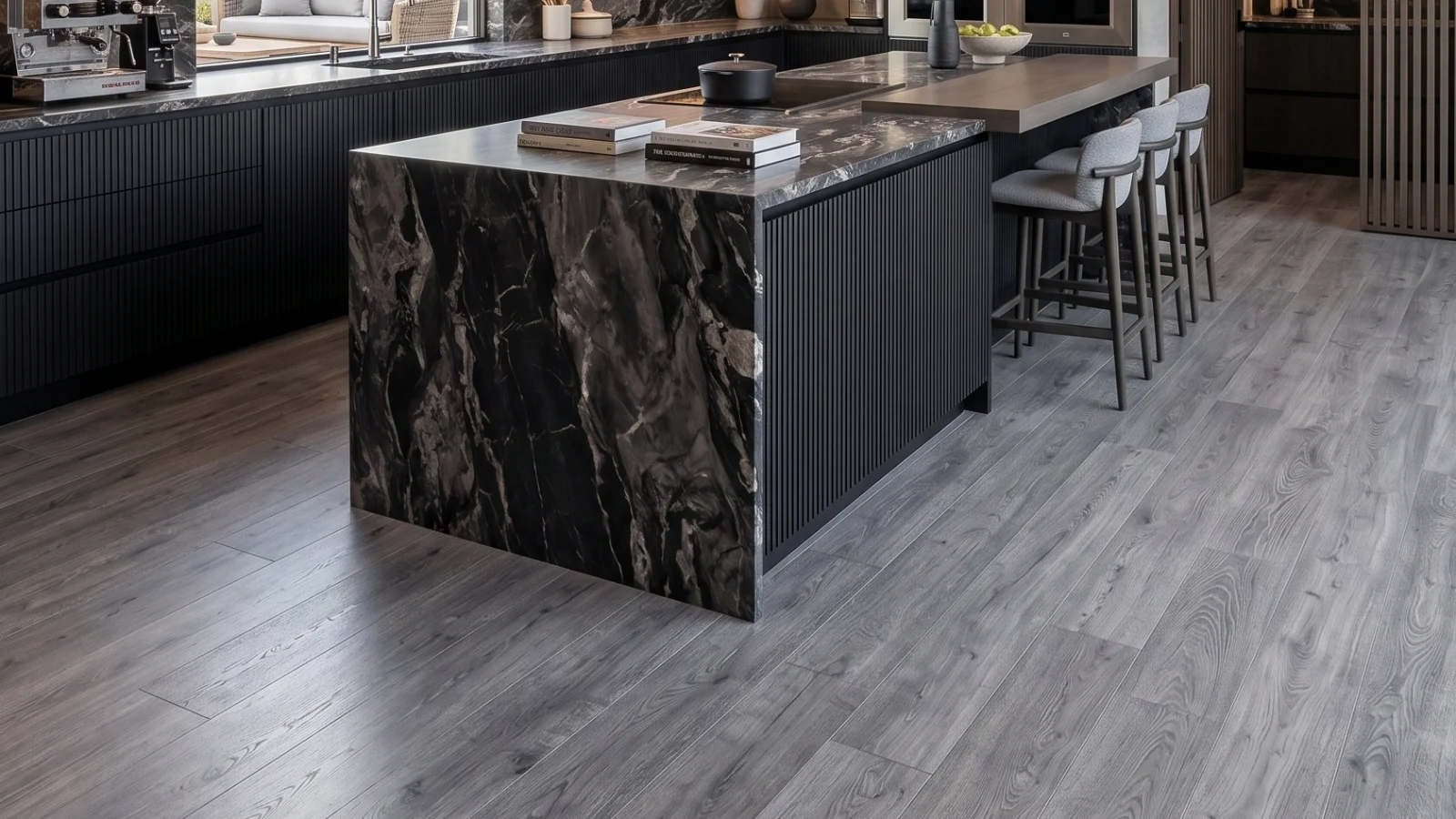 Modern kitchen with gray wood-look spc flooring, black marble island, and dark cabinetry. by PVC Global Imports USA LLC in Li